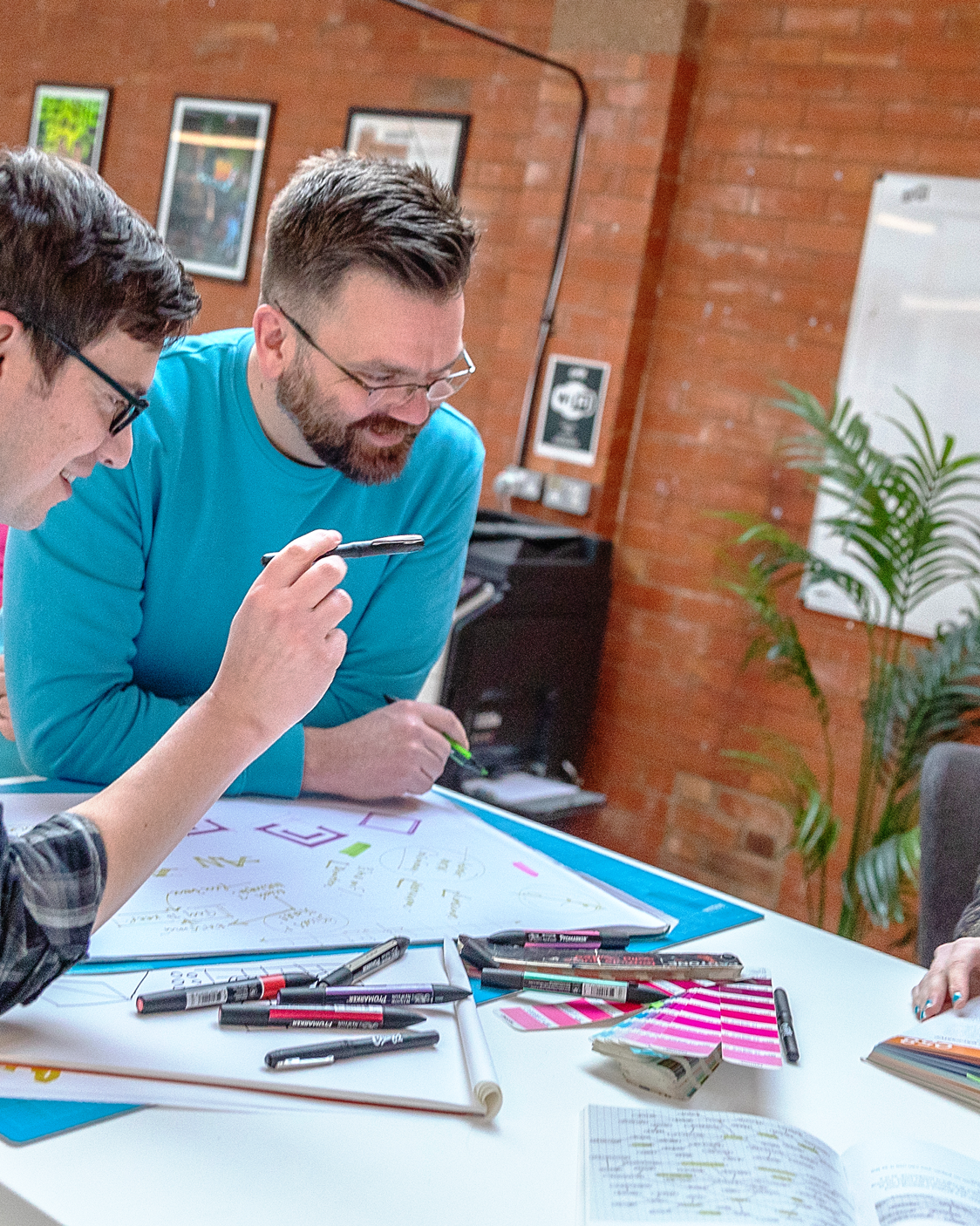 Creative62 team collaborating on a creative project