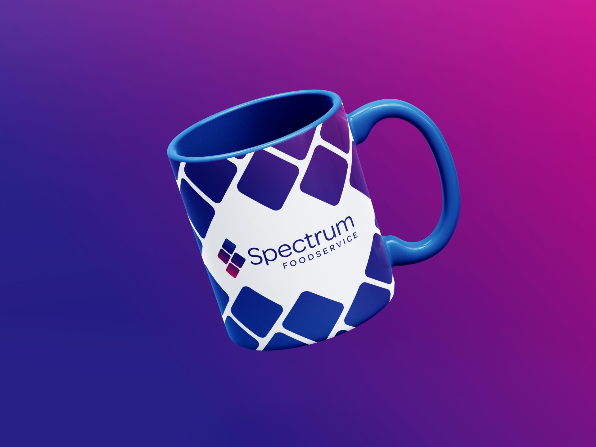 White mug with the Spectrum logo and branding, set on a blue and purple gradient background.
