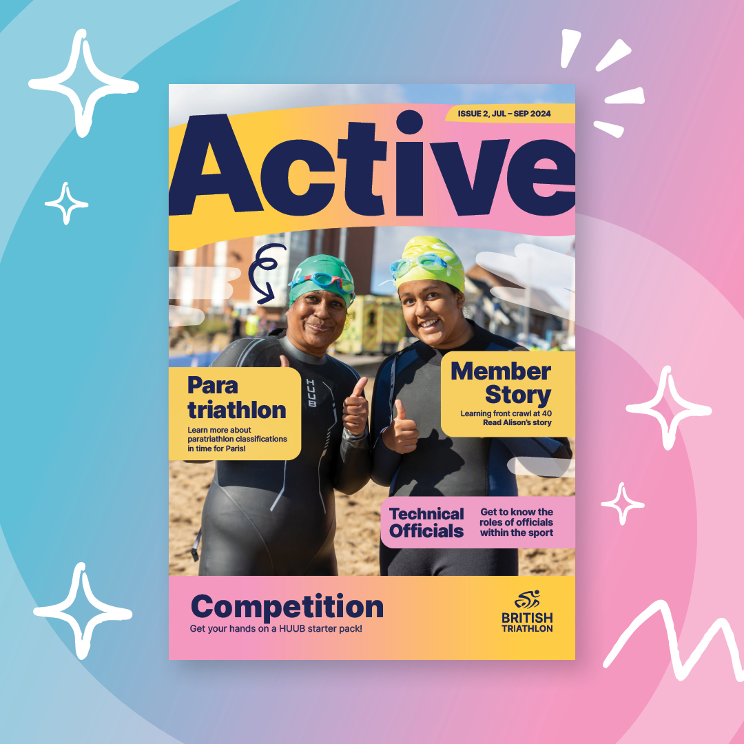 British Triathlon magazine cover in yellow and pink featuring two smiling female athletes giving thumbs up before their swim, representing enthusiasm and teamwork.